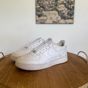 Nike Air Force ones, white.